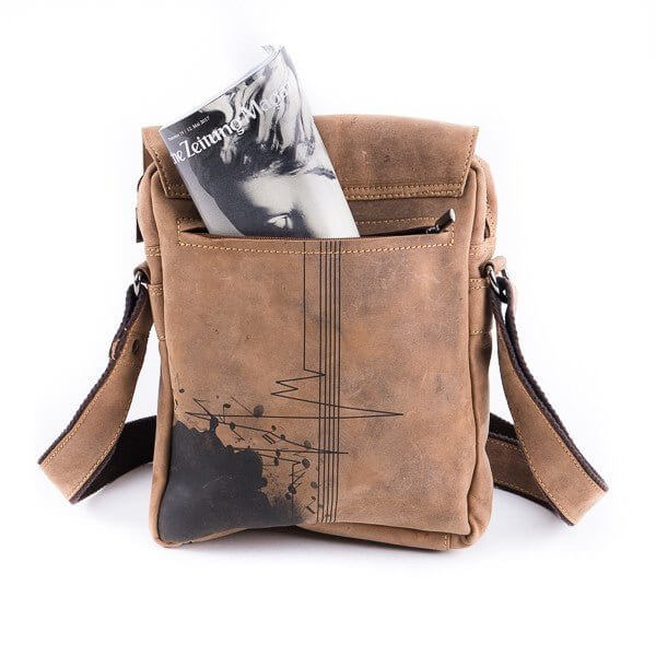 Bild: Tasche aus Leder mit Musik-Motiv die Rückseite mit Platz für eine Zeitschrift